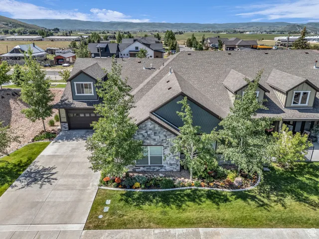 Aerial view of residential area with a mountainous background