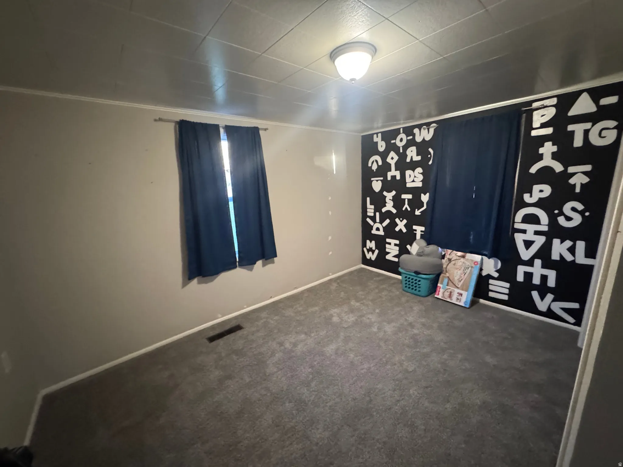 Spare room with carpet flooring and baseboards