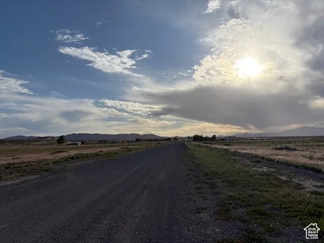 View of street with a mountain view and a view of rural / pastoral area