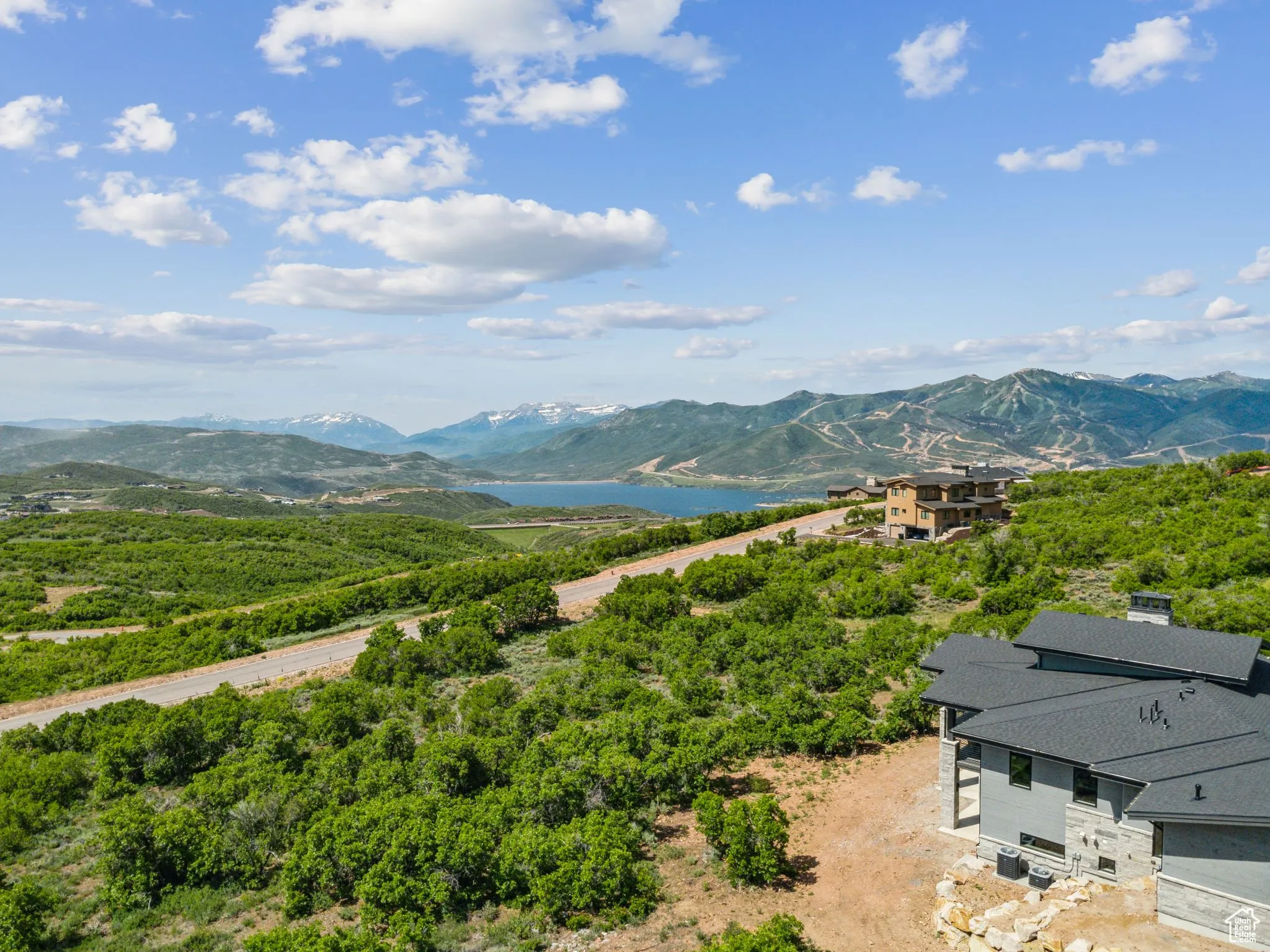 View of mountain backdrop with a nearby body of water
