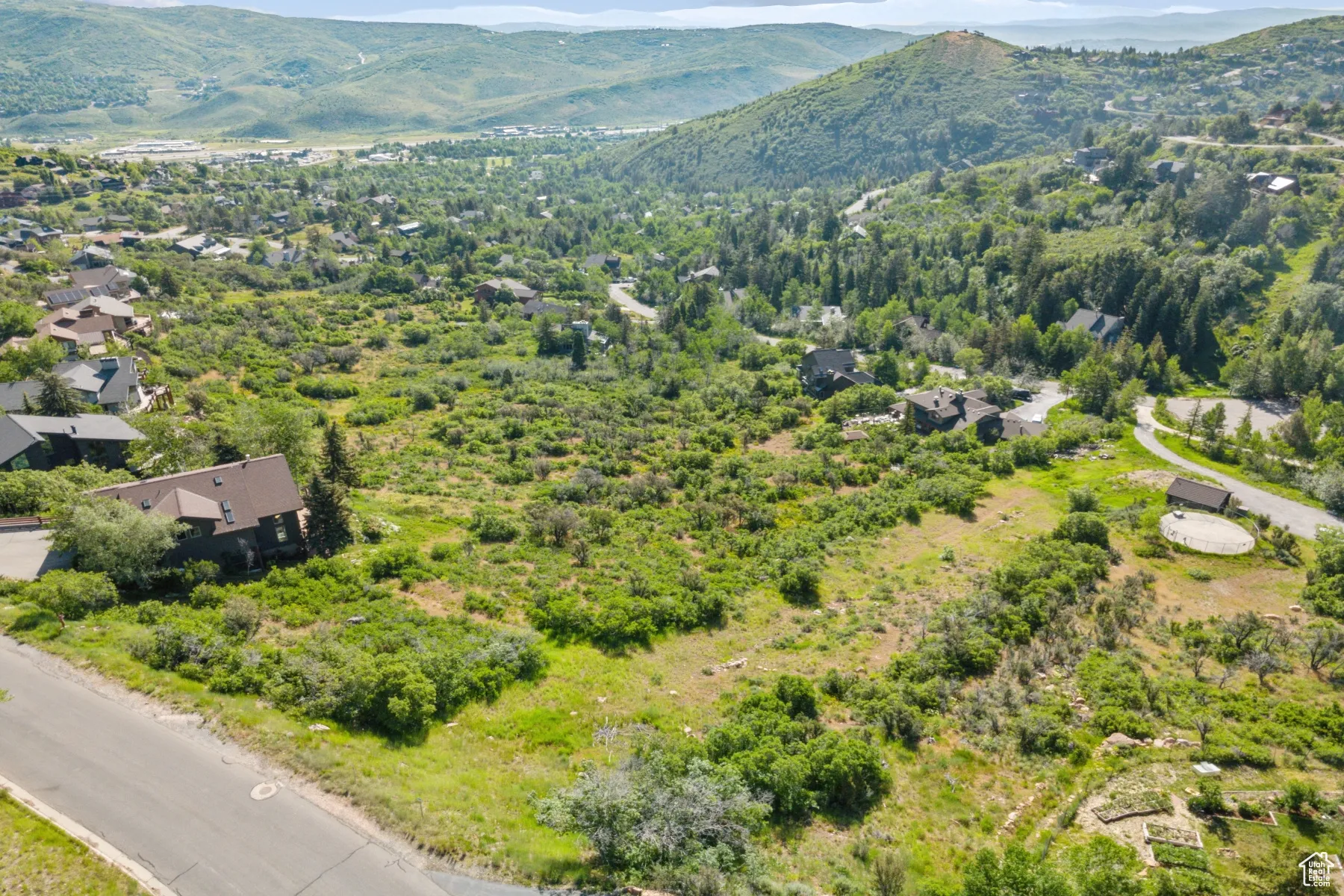 Drone / aerial view of a mountainous background
