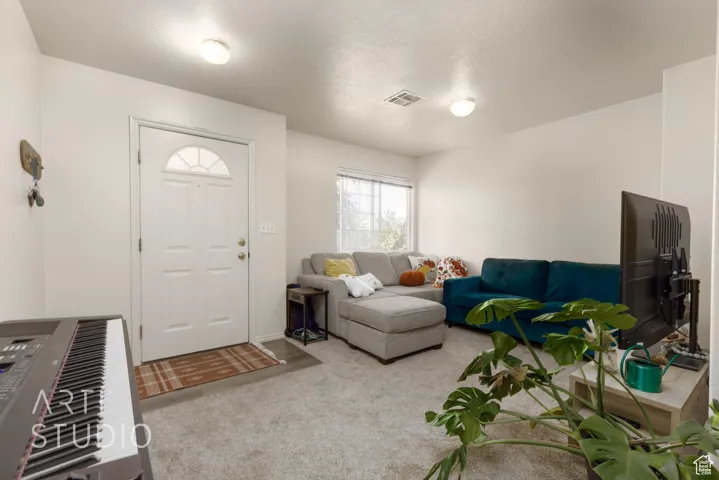 View of carpeted living area