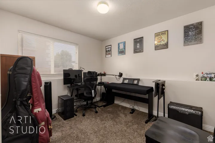 Office featuring carpet floors and baseboards