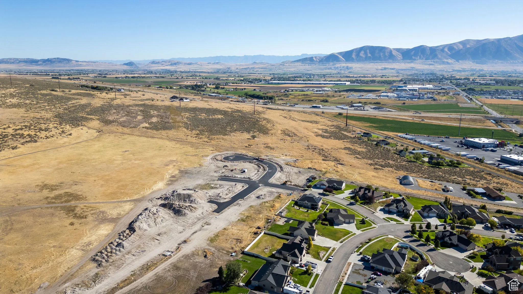Aerial view of residential area with a mountainous background