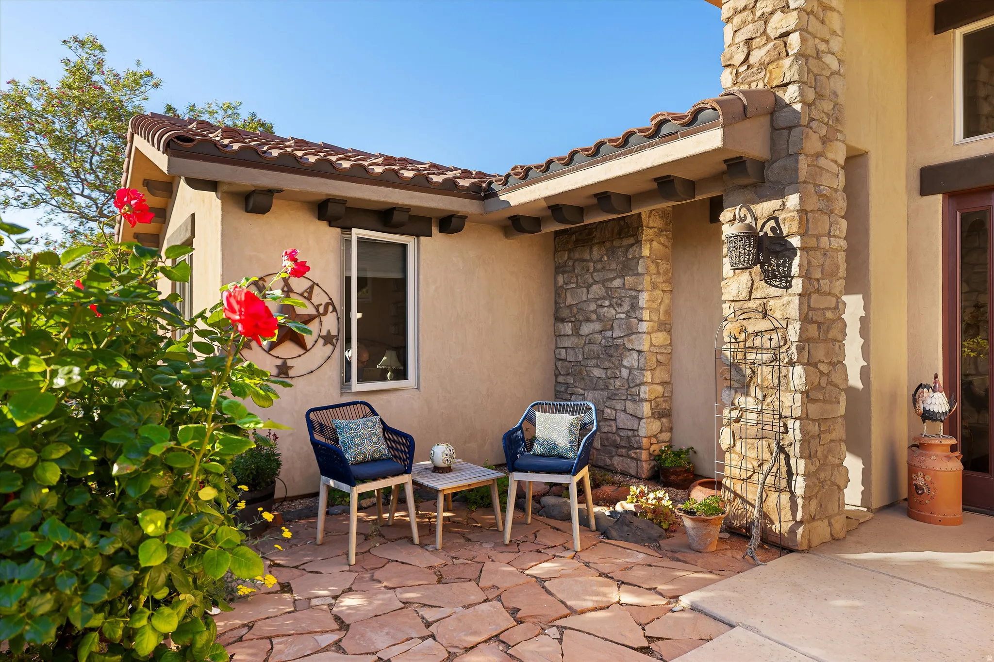 Exterior patio featuring irregular flagstone paving