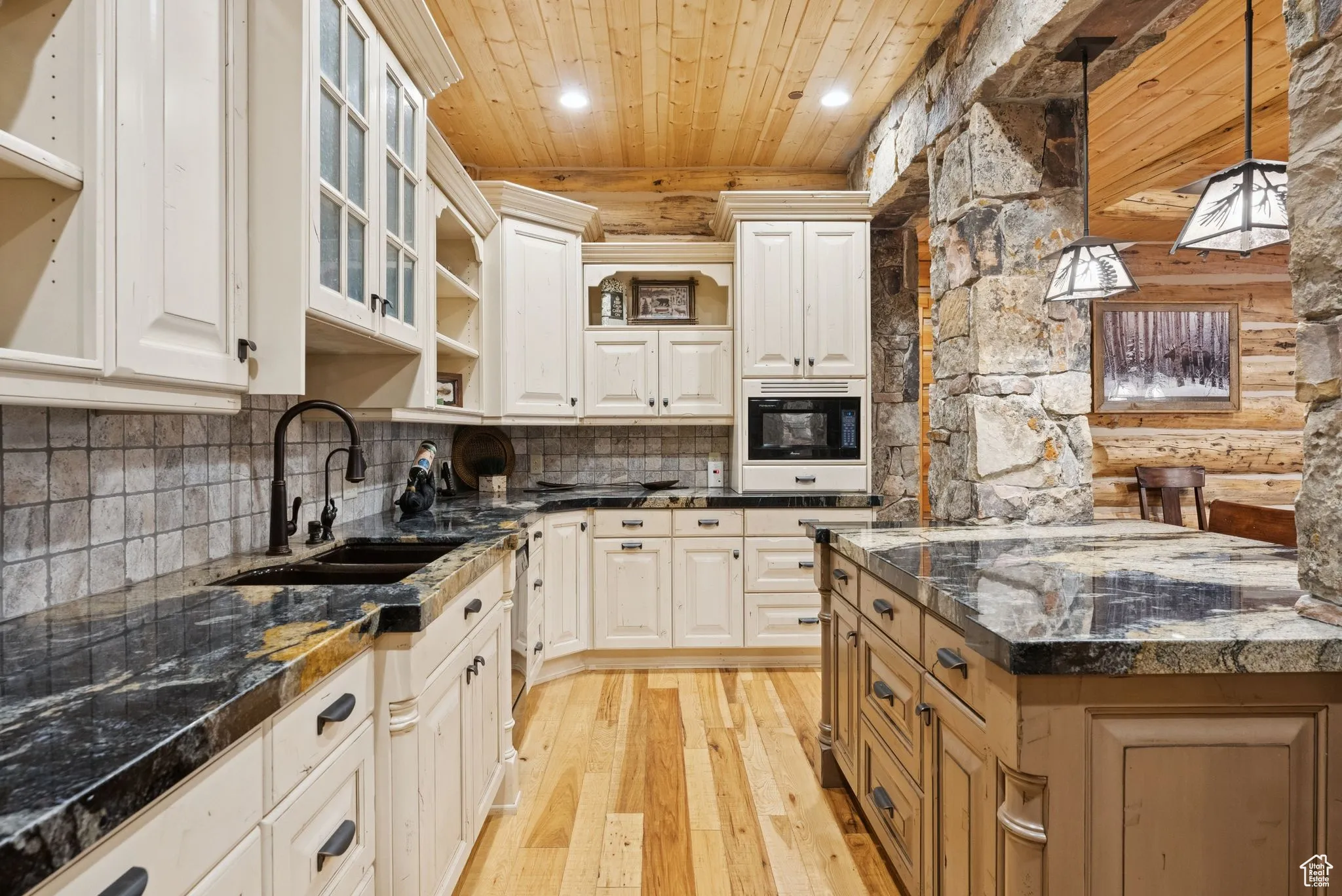 Kitchen featuring tongue-in-groove ceiling, light wood finished floors, open shelves, decorative backsplash, and recessed lighting