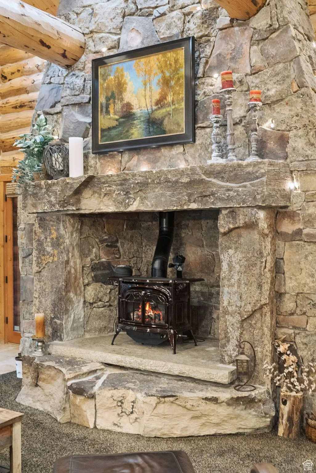 Detailed view of a remote operated propane stove and rustic walls