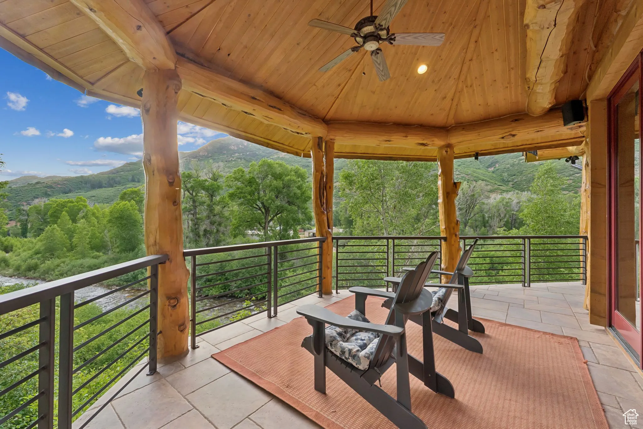 View of  master patio featuring a mountain view and ceiling fan