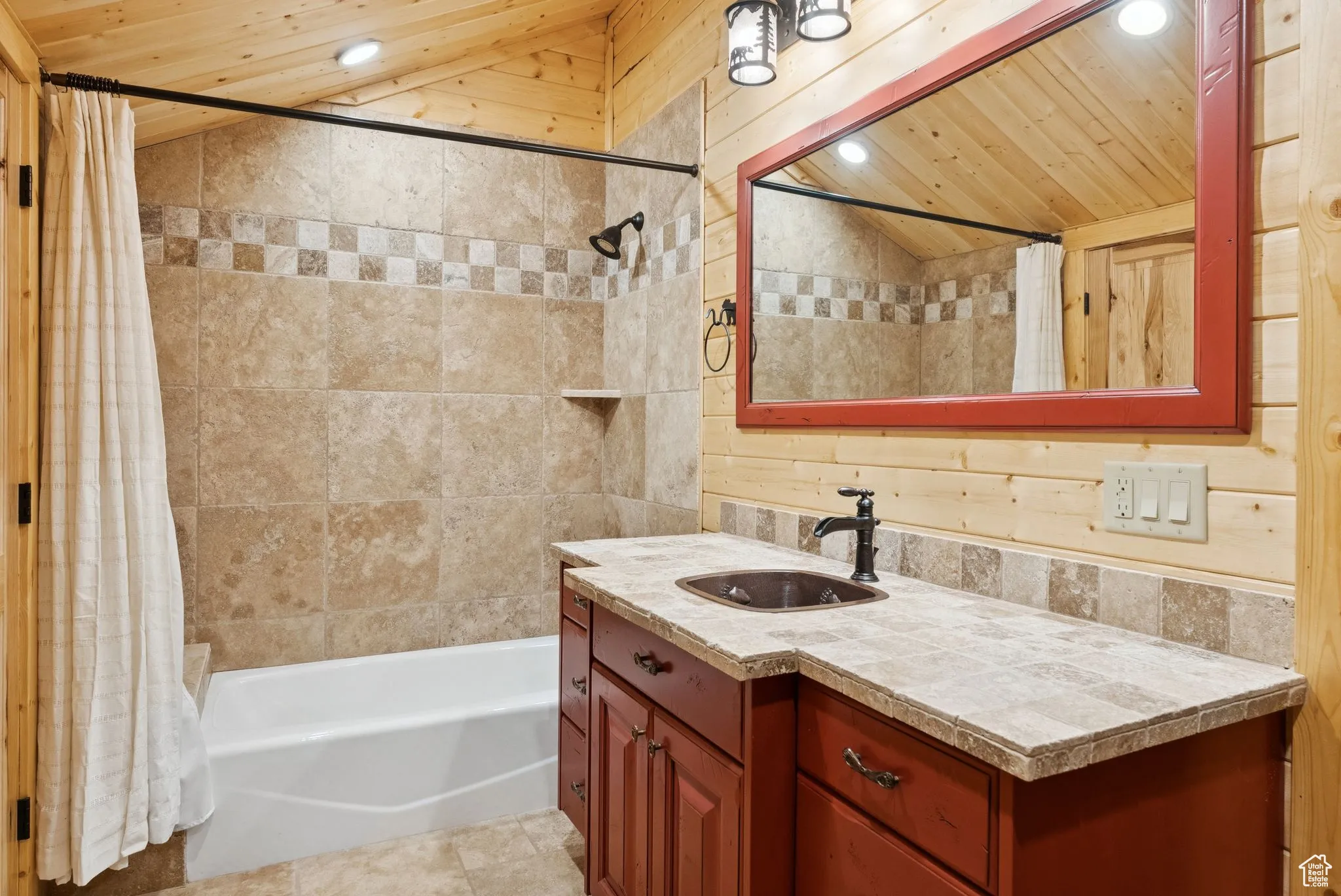 Bathroom with vaulted ceiling, tongue-in-groove ceiling, vanity, recessed lighting, and shower / bath combination with curtain