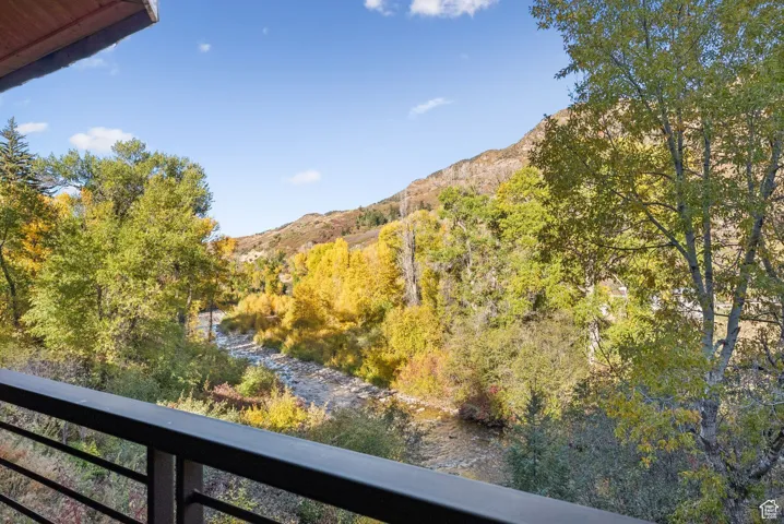 View of mountain backdrop with a large body of water