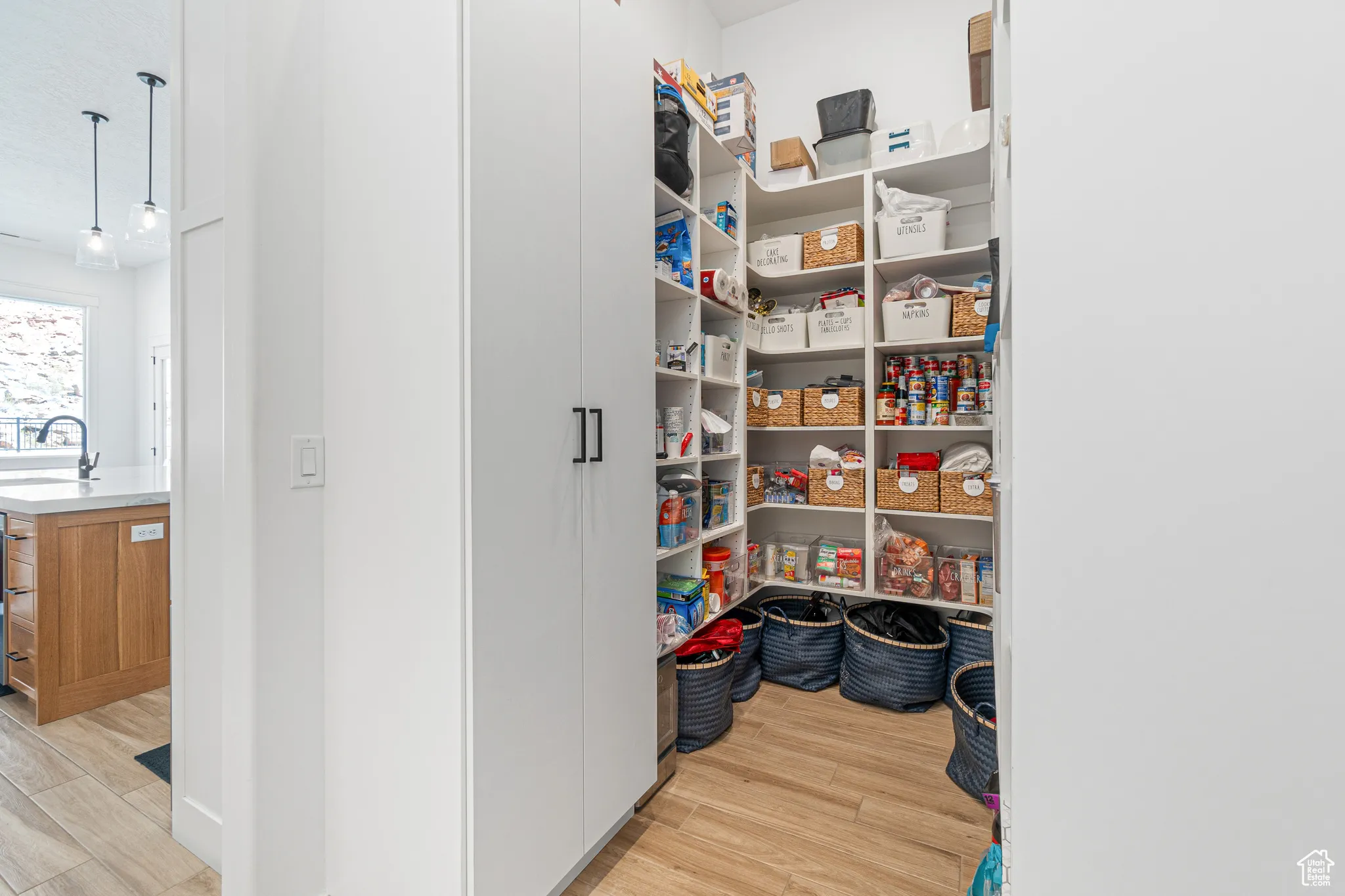 Pantry featuring a sink