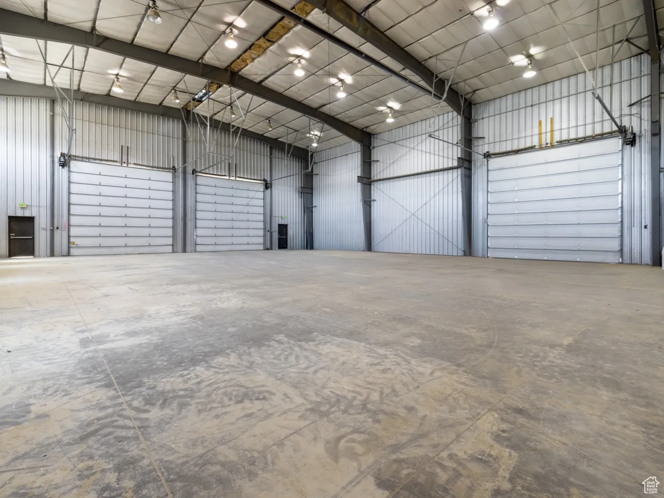 Garage featuring metal wall