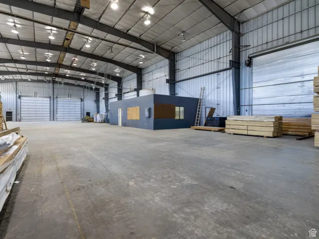 Garage featuring metal wall