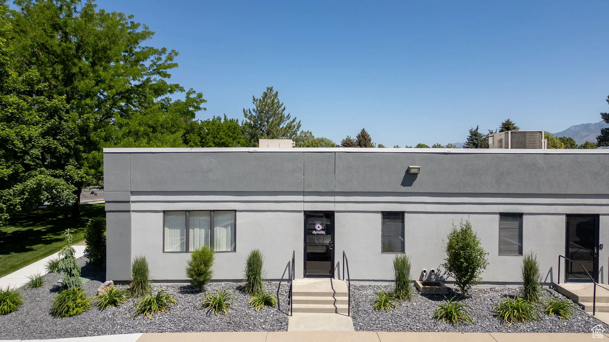 View of front facade with stucco siding