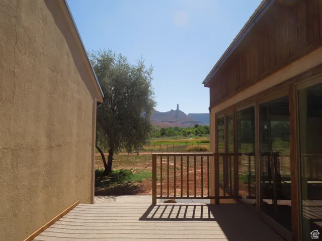 Wooden deck featuring a mountain view