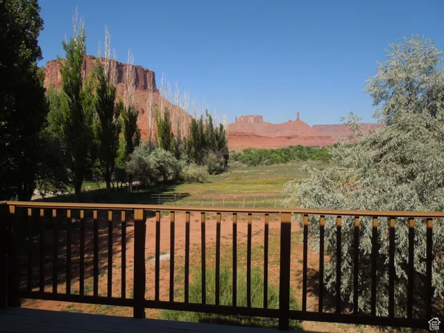 View of mountain backdrop featuring rural landscape