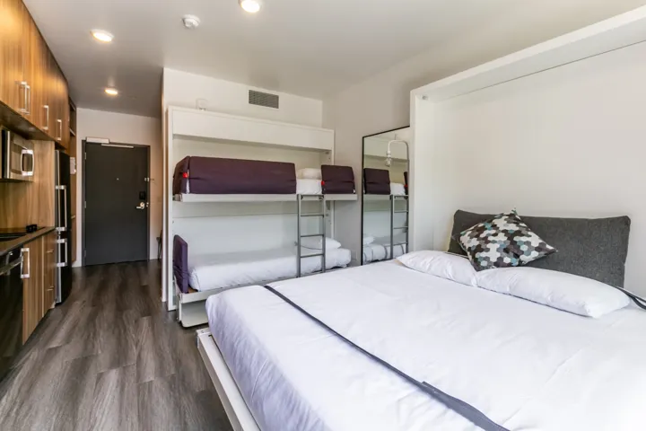 Queen bed and bunk beds