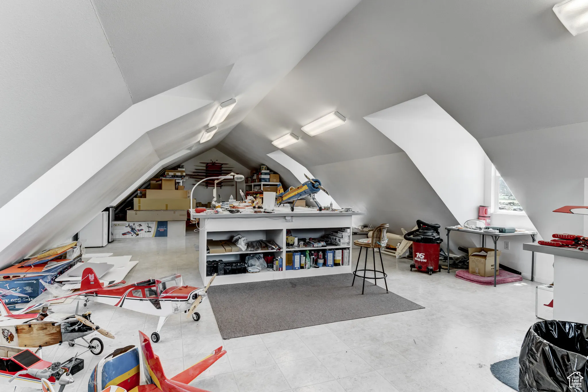 Additional living space featuring lofted ceiling