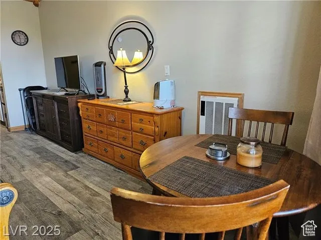 Dining area featuring wood finished floors