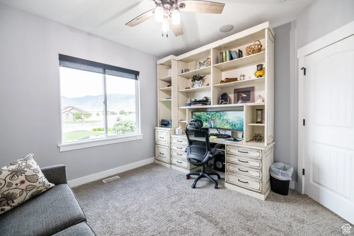 Office featuring carpet flooring and ceiling fan