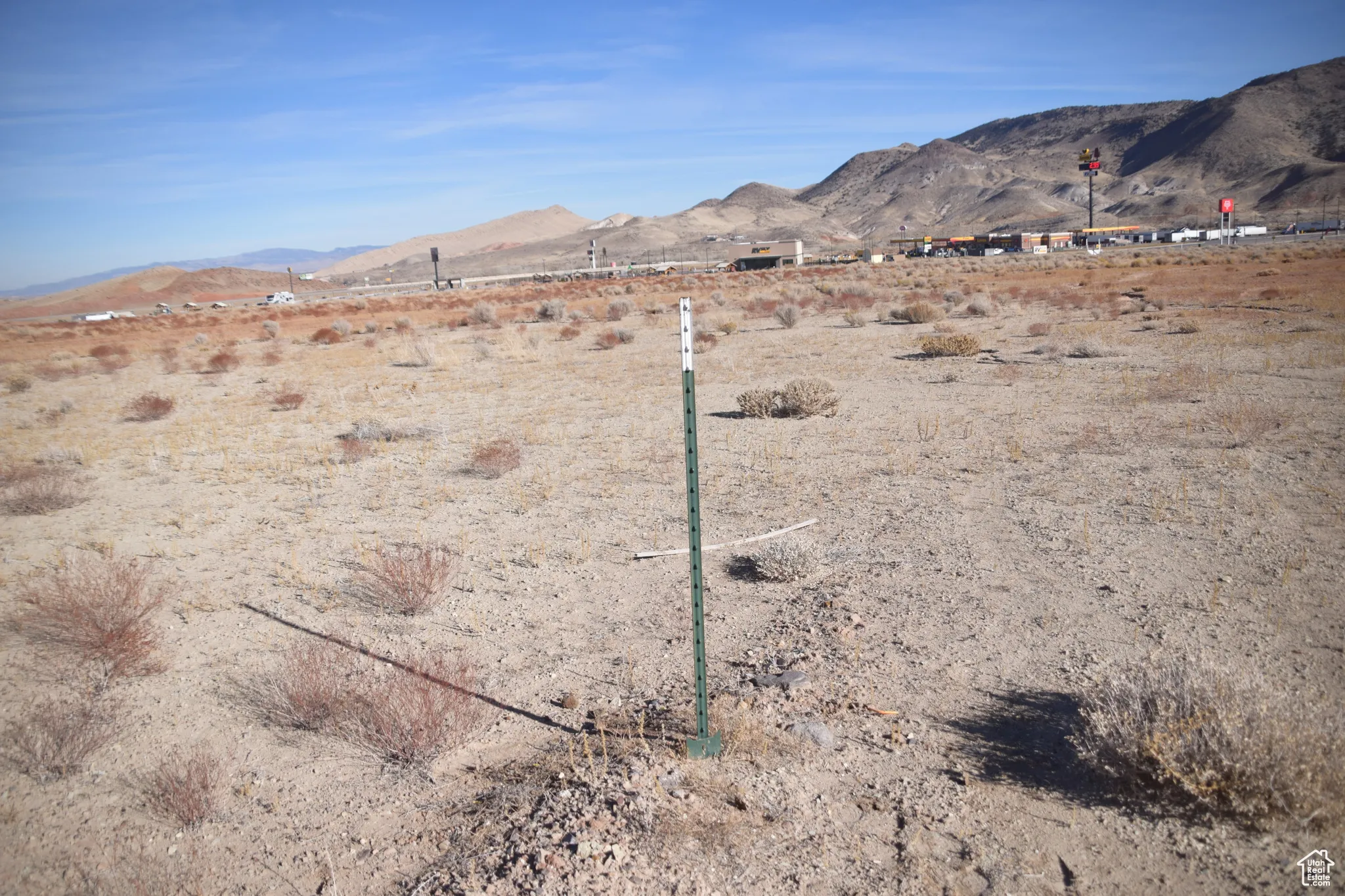 View of mountain backdrop with a desert landscape