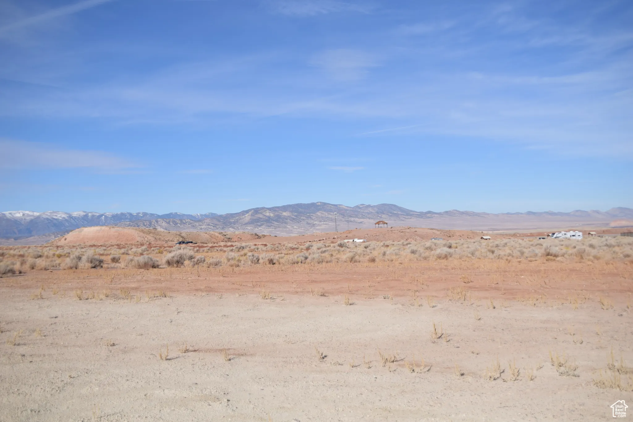 View of mountain backdrop with a desert landscape