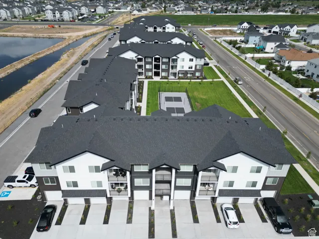Aerial view of residential area with a nearby body of water