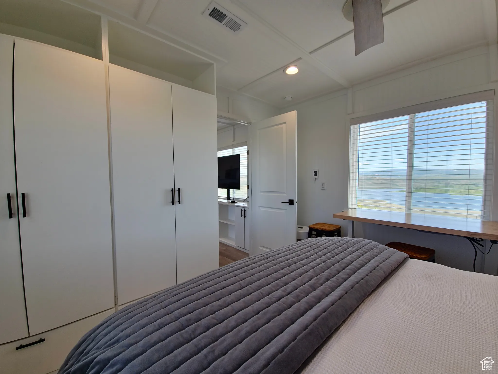 Bedroom with recessed lighting and wood finished floors