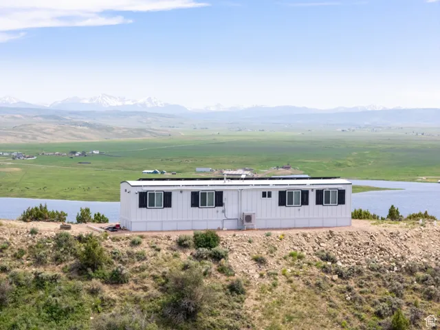 Mountain view featuring a large body of water