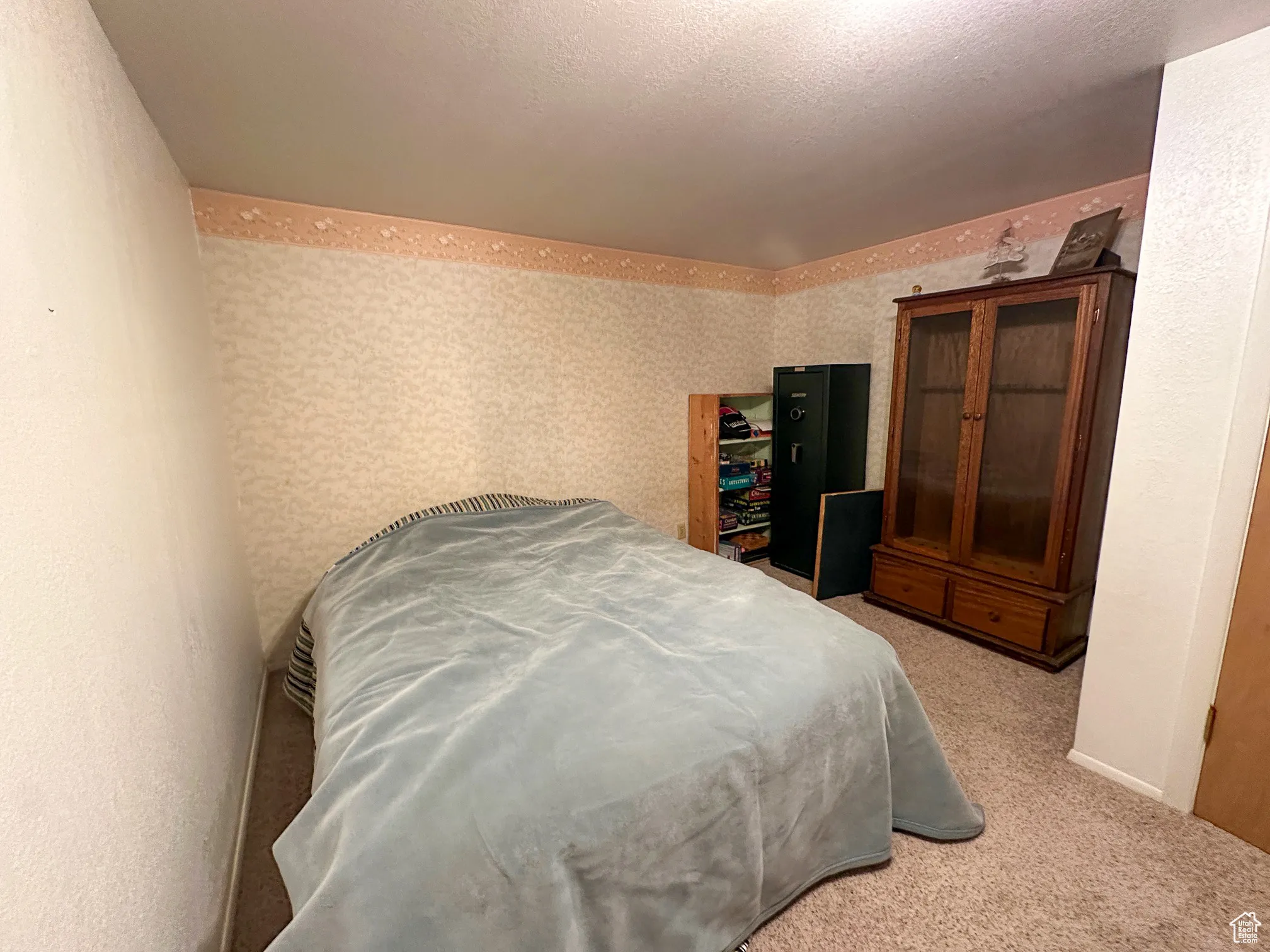 Bedroom featuring carpet