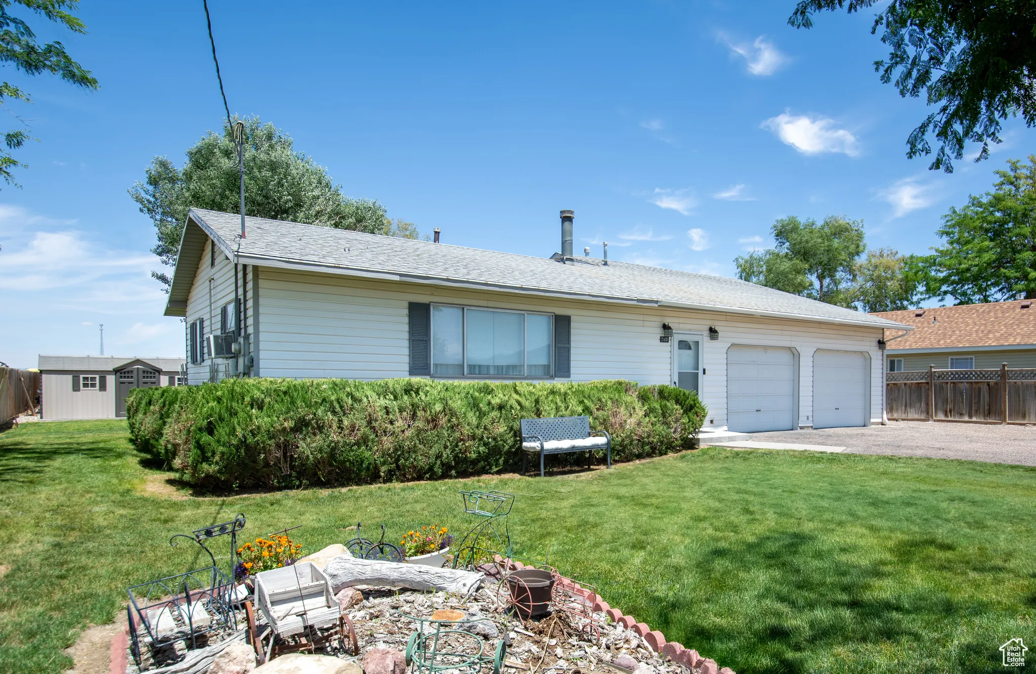 Single story home with an attached garage and driveway