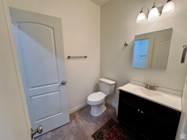 Bathroom featuring toilet and vanity