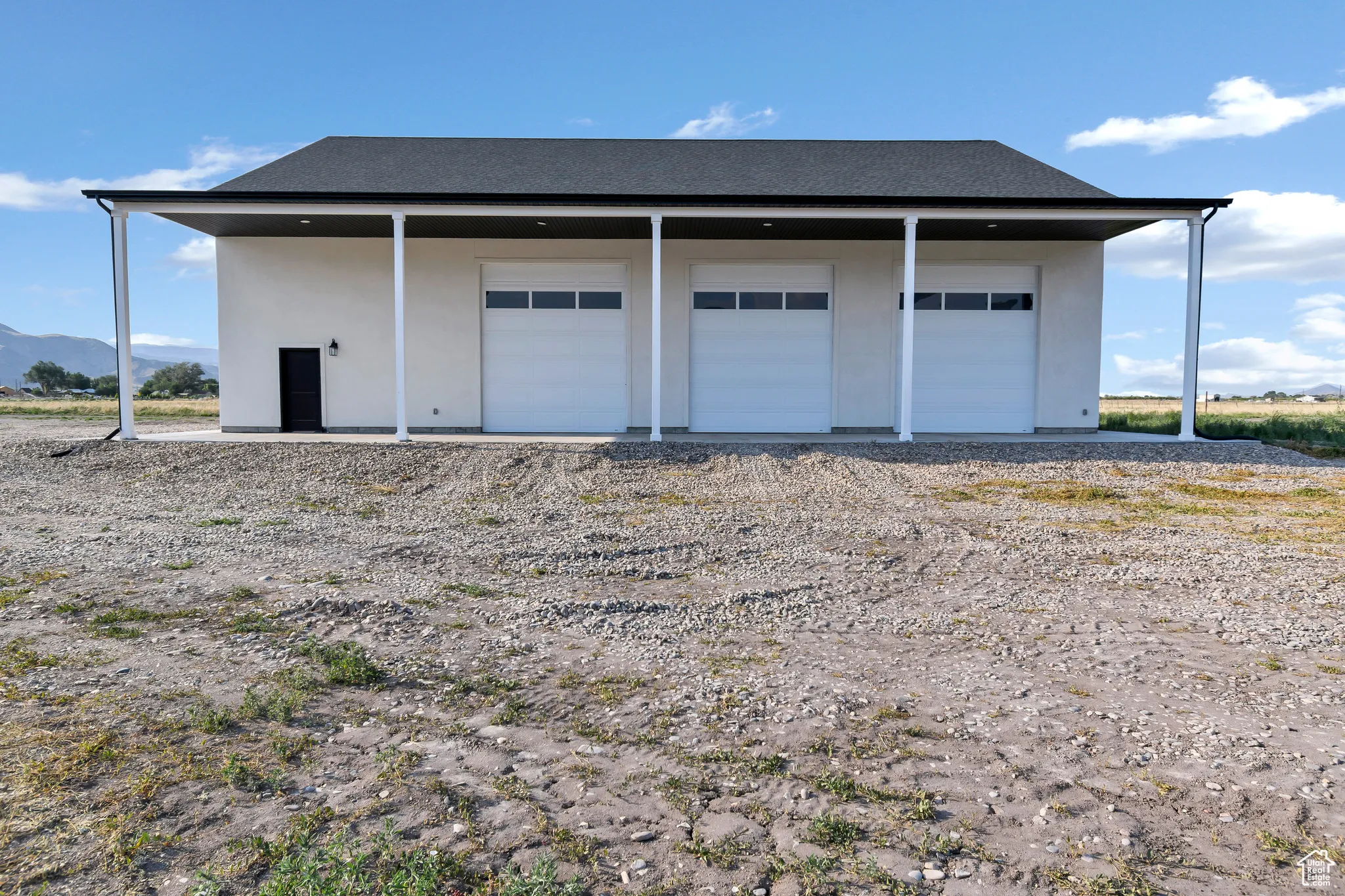 Detached garage with a mountain view