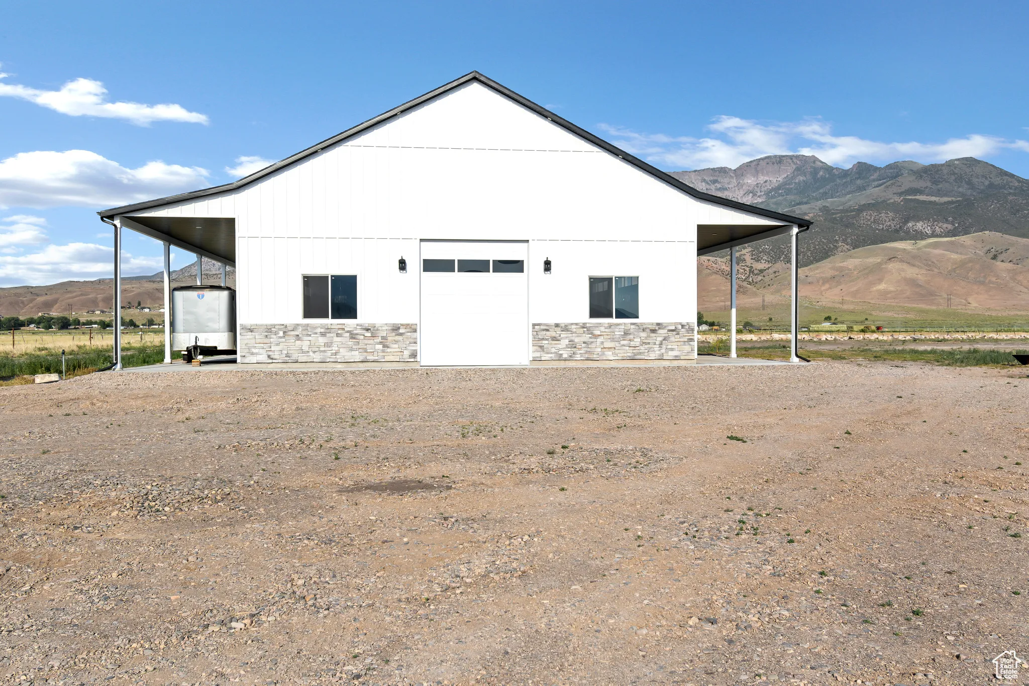 View of outbuilding featuring a mountain view
