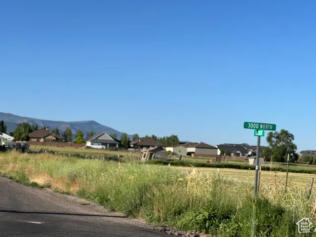View of asphalt road featuring a mountain view