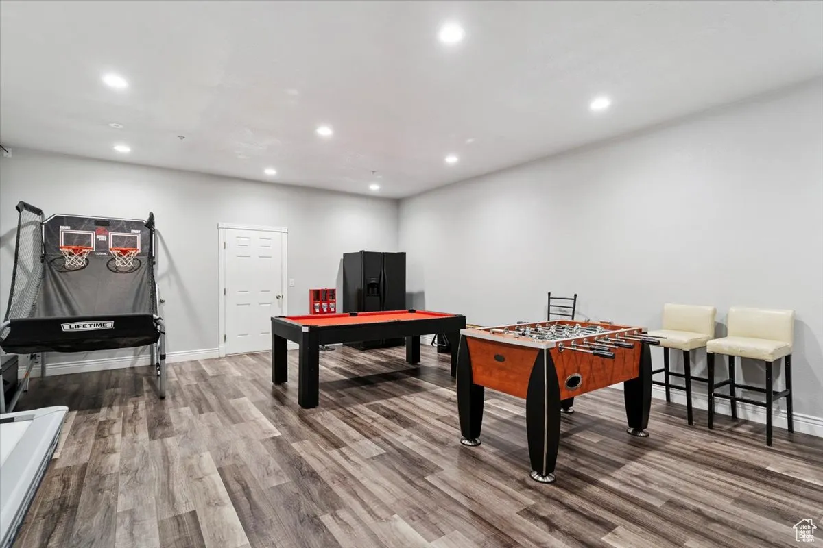 Rec room with recessed lighting, wood finished floors, and billiards