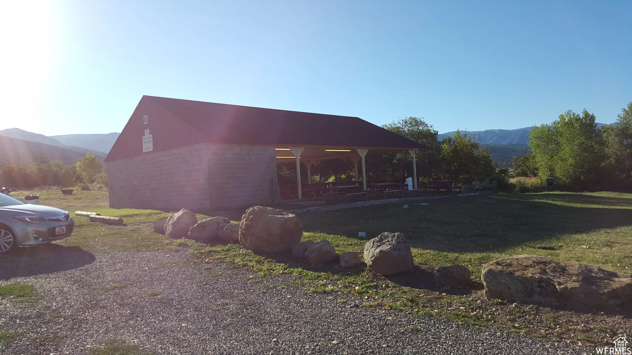 View of home's exterior with a mountain view and brick siding