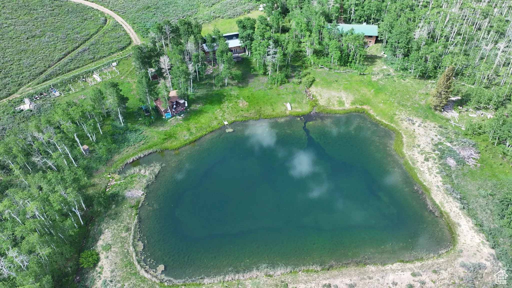 Aerial view of property's location featuring a nearby body of water