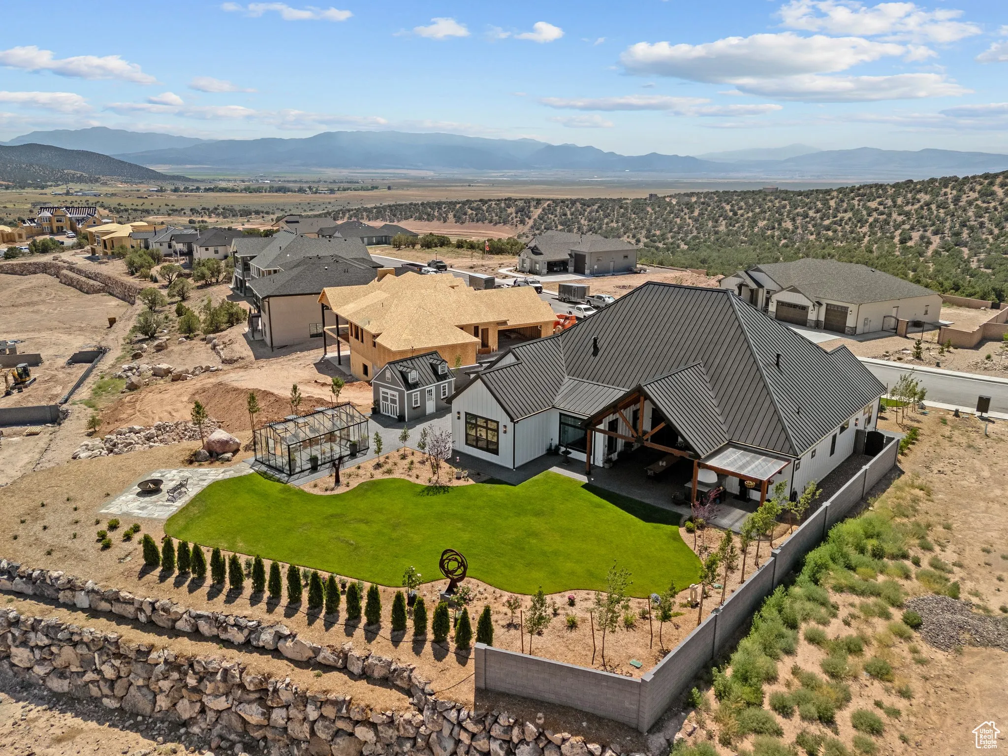 Aerial view of residential area with mountains