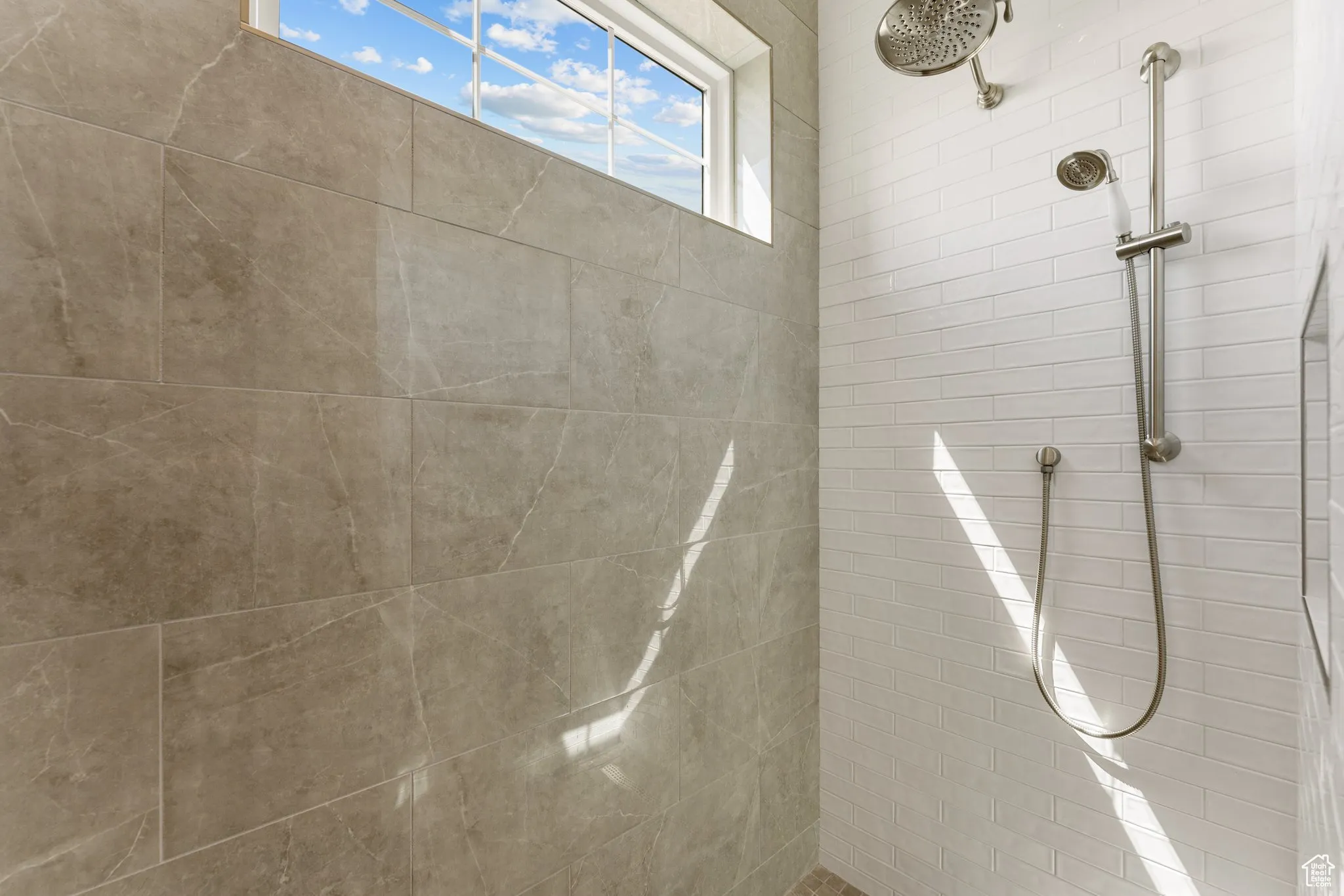 Full bathroom featuring tiled shower