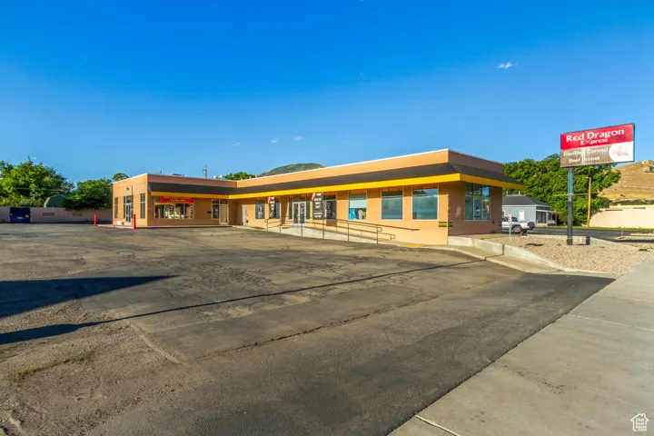 View of front facade with uncovered parking