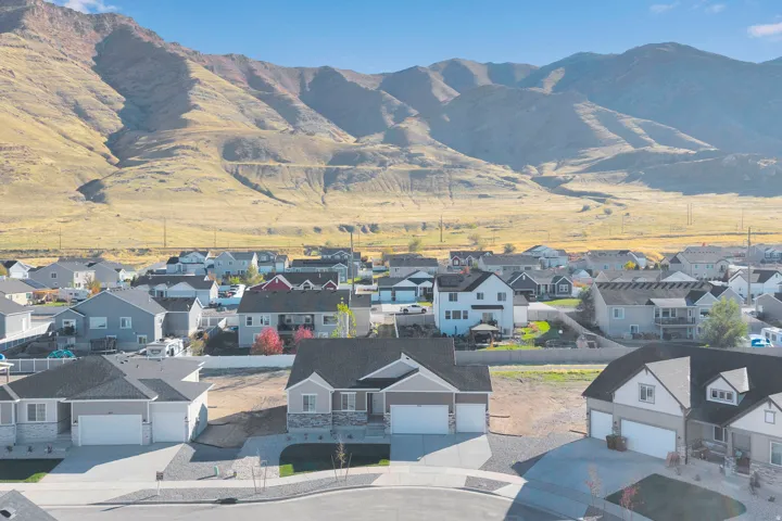 View of mountain background featuring nearby suburban area