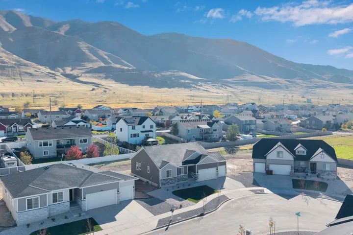 View of mountain backdrop with nearby suburban area