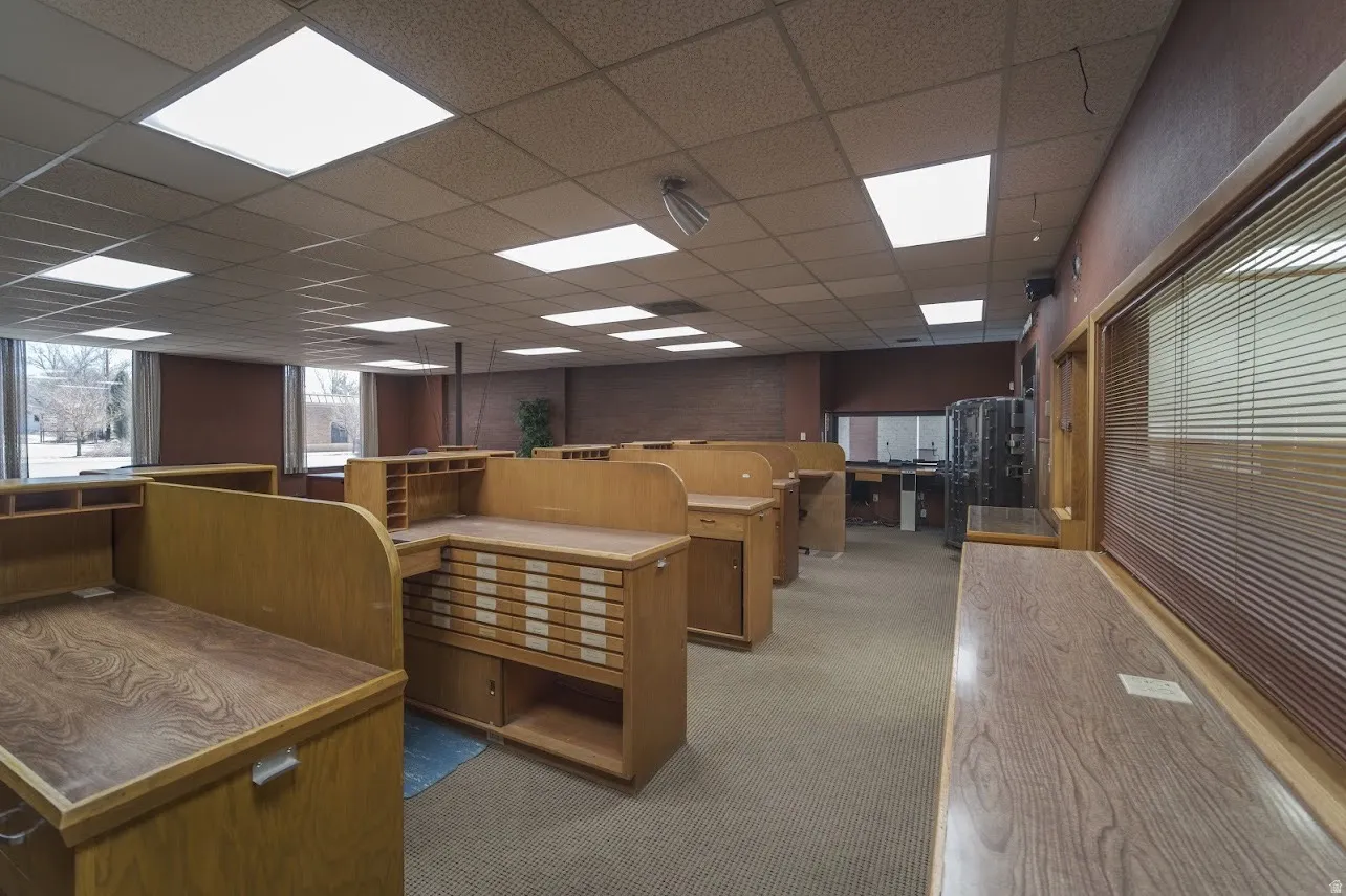 Office space featuring a paneled ceiling