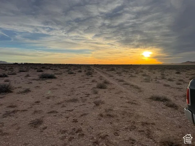 Water view featuring rural landscape and a desert landscape