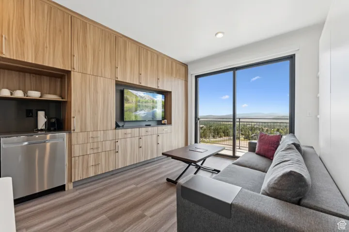 Living area featuring light wood-style flooring