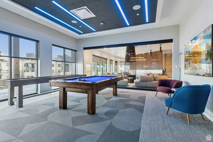 Recreation room with plenty of natural light, billiards table, carpet flooring, and recessed lighting
