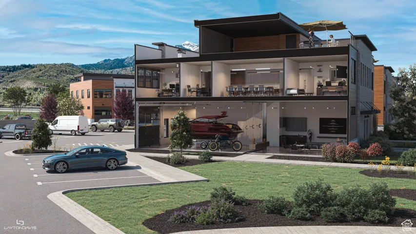 View of front of property featuring a mountain view, stucco siding, and a front lawn