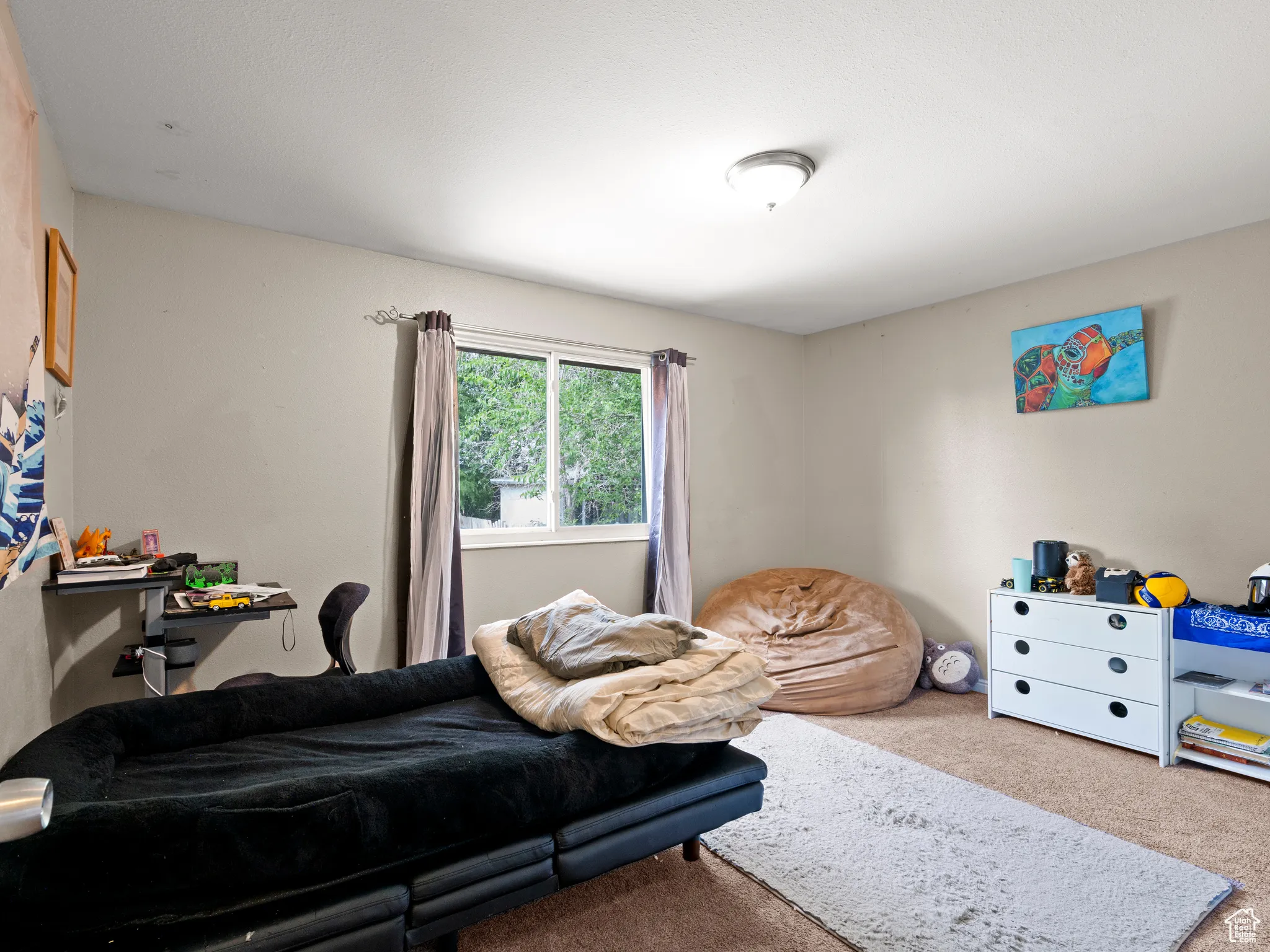 Bedroom featuring carpet floors