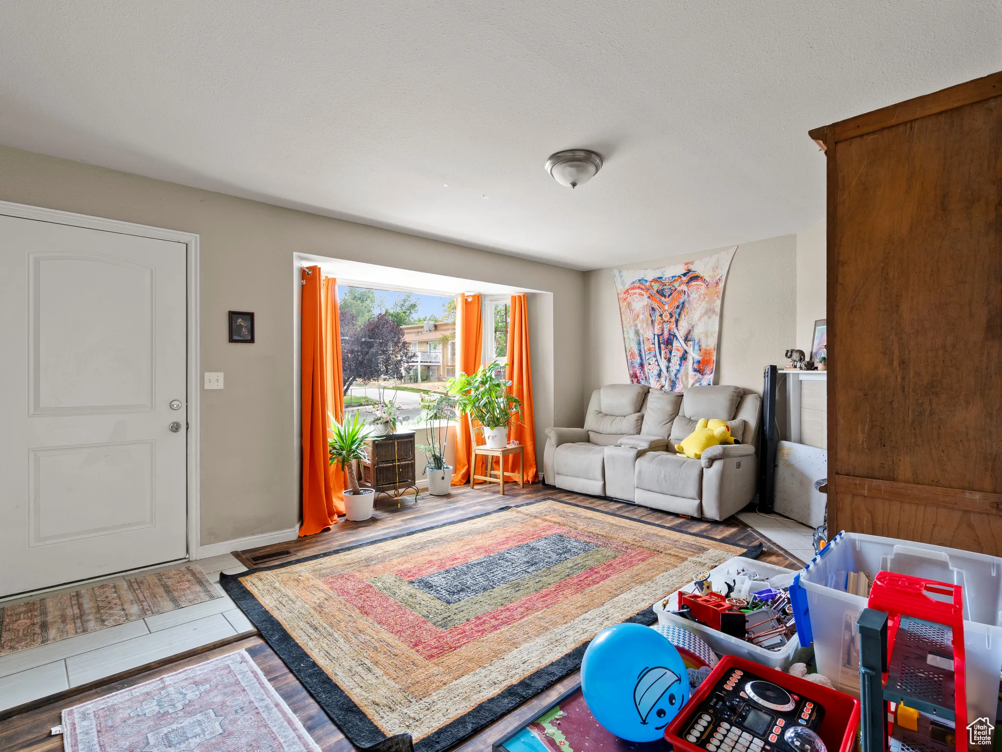 Living room featuring wood finished floors